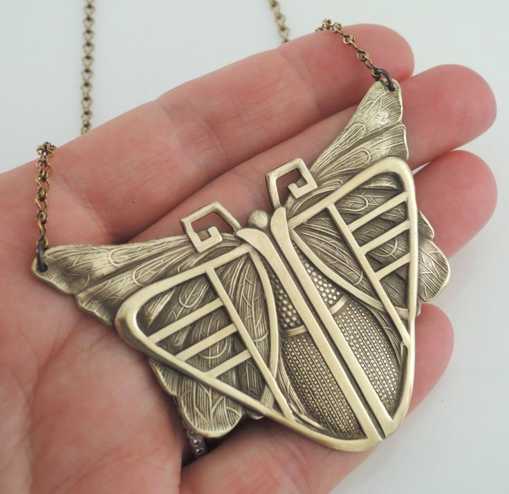 "Vintage Jewelry - Art Deco Necklace - Vintage Necklace - Butterfly Necklace - Statement Necklace - Chloes Vintage - handmade jewelry This is such a beautiful vintage necklace! A large brass Art Deco butterfly hangs from a pretty vintage brass ladder chain. So very bold and feminine. Chloe says, \"Wear it and feel fabulous!\" This pendant is 3\" wide and 2 1/8\" tall Thanks for visiting Chloe's" Handmade Brass Art Deco Jewelry, Artistic Copper Jewelry Gift, Art Nouveau Jewelry With Artistic Design For Gift, Handmade Art Nouveau Pendant Necklace, Handmade Art Nouveau Brass Jewelry, Bronze Jewelry With Unique Design For Gift, Handmade Art Nouveau Jewelry, Bronze Artistic Design Jewelry Gift, Handmade Metal Jewelry In Art Deco Style