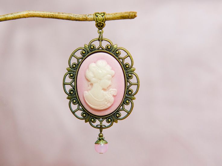 Cameo necklace with a large pink pendant, Selma Dreams Vintage Pink Oval Pendant Jewelry, Rose Gold Cameo Jewelry Gift, Rose Gold Cameo Jewelry For Gifts, Elegant Pink Locket Jewelry, Cameo Oval Pendant Necklace For Gift, Cameo Round Pendant Necklace For Wedding, Wedding Necklaces With Cameo Round Pendant, Cameo Oval Pendant Jewelry Gift, Pink Cameo Necklace For Gifts