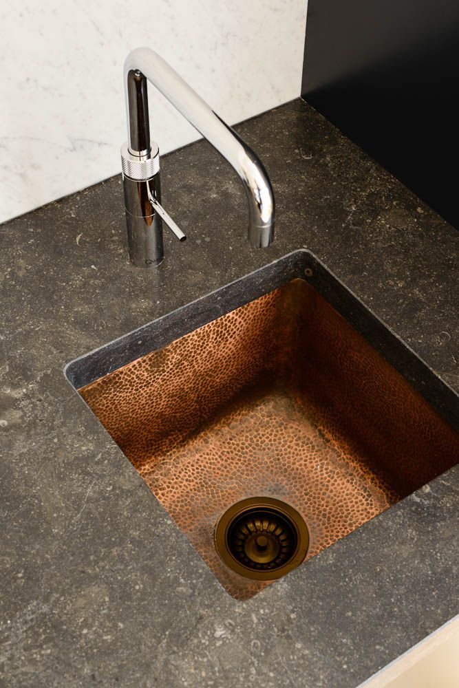 an instagram page with a copper sink and faucet in the corner, which reads instagram likes