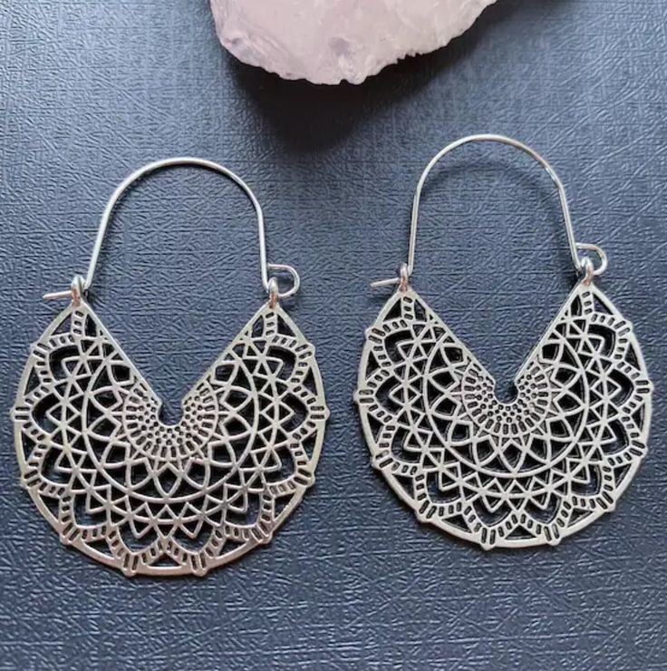 Silver boho earrings, Mandala flower hoops, Large hoops, Circle statement hoop earrings, Hollow floral hoops, Bohemian tribal jewelry ❤️Boho your way! Thanks for stopping by! We have many unique items here, please take a moment to visit! -Your order will be shipped out within 2 business days after the order has been received. -These earrings are light weight and easy to wear, perfect for your daily look. -They're designed with different geometric shapes like circle, triangle, diamond, teardrop etc, they can show your personality in different styles. -These earrings are also perfect gifts for friends and families, the exquisite accessory for women.  -They fit all of your fashion needs, for any formal and informal occasions, such as party, vacation, prom, wedding, birthday and anniversary, h Metal Hoop Earrings With Intricate Dangle Design, Adjustable Bohemian Flower Earrings, Adjustable Bohemian Drop Flower Earrings, Nickel Free Small Hoop Earrings For Summer, Nickel-free Small Hoop Earrings For Summer, Adjustable Nickel-free Hoop Earrings For Summer, Silver Nickel-free Hoop Earrings For Summer, Metal Hoop Earrings With Intricate Design For Festival, Bohemian Dangle Flower Earrings For Pierced Ears