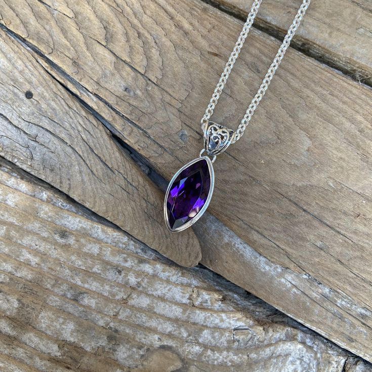 "Beautiful deep purple amethyst necklace...1 1/4\" tall with bail by 7/16\" wide at the widest spot, cast and antiqued in sterling silver 925 with a gorgeous 20mm by 10mm marquise shape amethyst stone...the chain is 18\" long also in sterling silver 925 with a lobster catch" Purple Amethyst Oval Pendant Jewelry, Purple Spiritual Jewelry Stamped 925, Spiritual Purple Jewelry Stamped 925, Spiritual Purple Jewelry With Large Pendant, Purple Sterling Silver Pendant Necklace, Purple Sterling Silver Oval Pendant Necklace, Purple Sterling Silver Spiritual Necklaces, Hallmarked Amethyst Oval Pendant, Purple Sterling Silver Necklace With Large Pendant