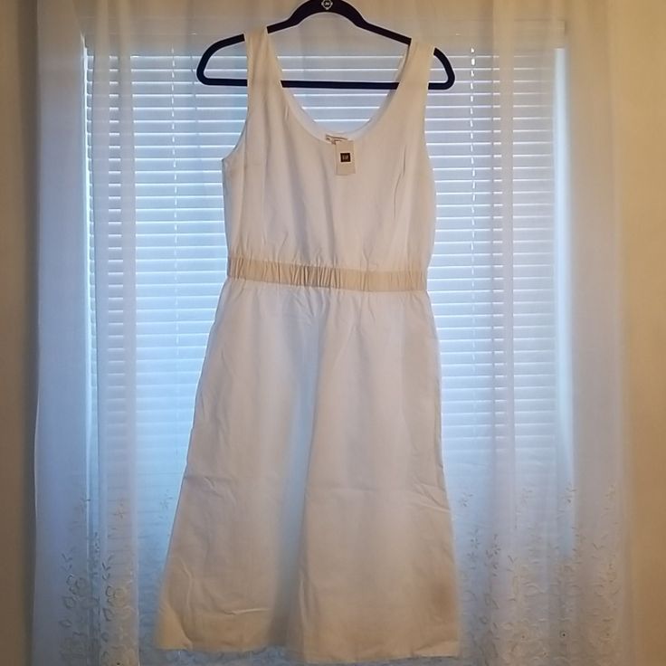 Nwt White Cotton Lined Gap Dress With Pockets. Kind Of A Lineish. Size Small. Measurements: Shoulder To Bottom =41 Inches Armpit To Armpit =17 Inches Elegant Beach Dresses By Gap, Elegant V-neck Midi Dress By Gap, Elegant V-neck Gap Dress, Elegant White Gap Dress, Gap Cotton Knee-length Midi Dress, Gap Cotton Summer Midi Dress, Gap Knee-length Cotton Midi Dress, Gap Cotton Midi Dress For Summer, Fitted Cotton Midi Dress By Gap