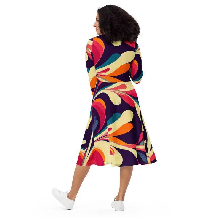 A groovy fusion of retro and modern style! This fab psychedelic midi dress blends far out vibes with timeless elegance. Its soft fabric and flattering cut will ensure you feel comfortable and feminine all day long. Plus, the fitted waist and flared bottom part of the dress will accentuate the wearer’s naturally beautiful silhouette. The best part about the dress? It. Has. Pockets. • 95% polyester, 5% elastane (fabric composition may vary by 1%) • Fabric weight: 6.19 oz/yd2 (210 g/m2) (weight may Multicolor A-line Maxi Dress For Fall, Multicolor Dresses With Vibrant Print For Fall, Fall Multicolor Dress With Vibrant Print, Fall Graphic Print Knee-length Dress, Retro Multicolor A-line Dress, Retro Multicolor Maxi Dress With Vibrant Print, Vibrant Fitted Multicolor Midi Dress, Fitted Multicolor Vibrant Midi Dress, Retro A-line Midi Dress For Fall