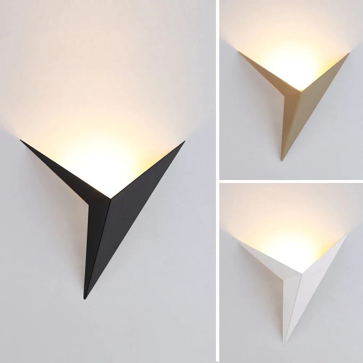 three different angles of a wall light that is white and black, with one lamp on each side