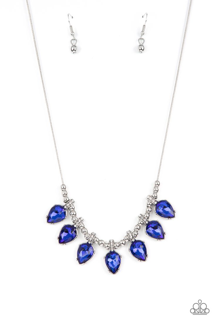 a necklace and earring set with blue stones