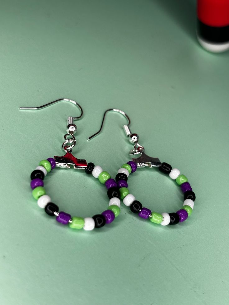 Beetlejuice inspired beaded hoops Beaded Beetle Juice Earrings, Beetle Juice Earrings, Beetlejuice Jewelry Diy, Beetlejuice Crafts Diy, Beetlejuice Jewelry, Beetlejuice Earrings, Beetlejuice Diy, Bookish Crafts, Jewellery Business