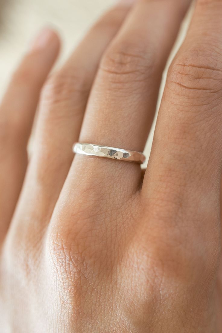 Chic, half-round band with a hammered finish. Perfect for wearing solo or stacking with other rings! - 3mm hammered half-round band - .925 Sterling Silver- Hypoallergenic - Comes neatly packaged in a kraft box ready for gifting Hammered Ring, Hammered Band, Hammered Rings, Silver Stacking Rings, Back Jewelry, Round Rings, Glass Ceramic, Hammered Silver, Stacking Ring