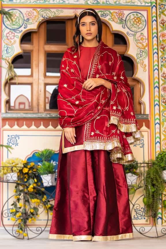 Maroon kurta in taffeta silk base. Comes with sharara and a satin organza dupatta with aari embroidery. - Aza Fashions Designer Wear Sharara With Gota Work For Festive Season, Designer Festive Sharara With Gota Work, Designer Wear Traditional Drape Palazzo Set, Designer Chinon Palazzo Set With Traditional Drape, Designer Palazzo Set With Traditional Drape, Designer Lehenga With Dupatta And Straight Kurta, Designer Chanderi Sharara With Resham Embroidery, Chinon Sets With Dabka Work In Traditional Drape, Palazzo Set With Resham Embroidery In Chinon