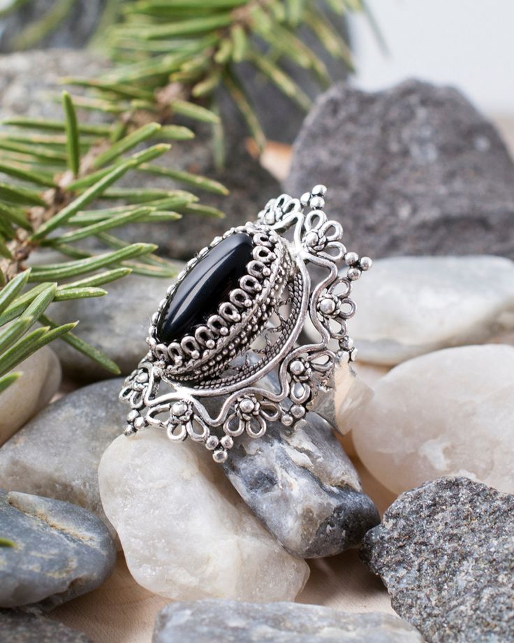 925 Sterling Silver Genuine Onyx Artisan Crafted Filigree Cocktail Statement Ring Women Jewelry Gifts Boxed for Her Material: 925 Sterling Silver Genuine Natural Black Onyx gemstone Dimensions : 14 mm x 7 mm, Approximate Total Carat Weight: 3 Ring Face Length: 1.10 inches Comes with a gift pouch and box Free Domestic Shipping For this particular ring if desired We can change the stone to your favorite gem stone at a reasonable cost that is if the stone is not among what we are offering. Our fine Vintage Rings Silver, Silver Rings For Women Unique, Rings For Women Unique, Onyx Silver Ring, Earrings Oxidised, Oxidized Jewellery, Handmade Silver Rings, Pearl Rings Vintage, Oxidised Earrings