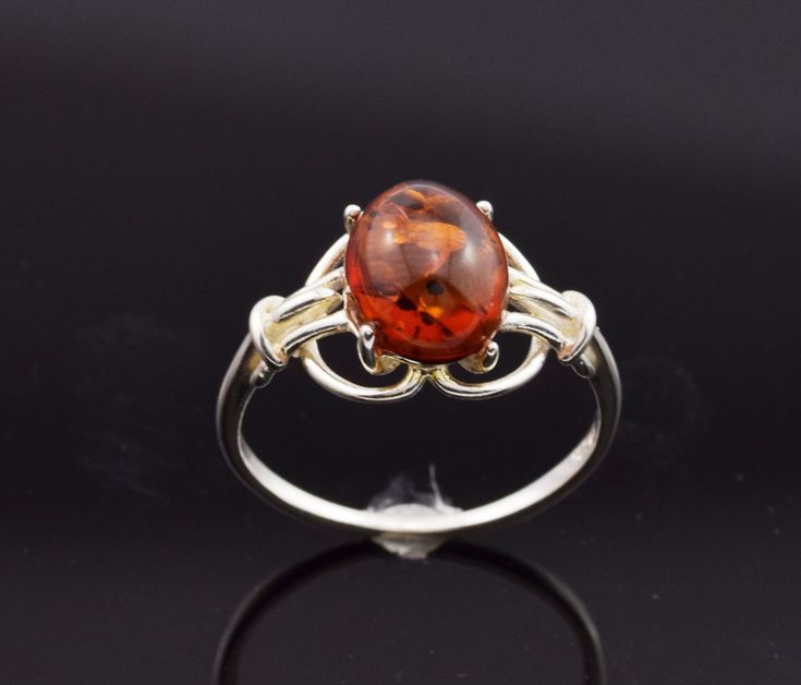 Amber size: 17mm x 12mm  Top of the ring: 15mm x 13mm Amber colour: honey  Materials: Baltic amber, 925 sterling silver - stamped on the item  Amber is natural, genuine, organic and comes from Gdansk, Poland  Simple&Elegant  Made from nature... Thank You for visiting my shop:) Gdansk Poland, Amber Ring, Natural Honey, Gdansk, Amber Color, Simple Elegant, Baltic Amber, Ring Silver, Rings Statement