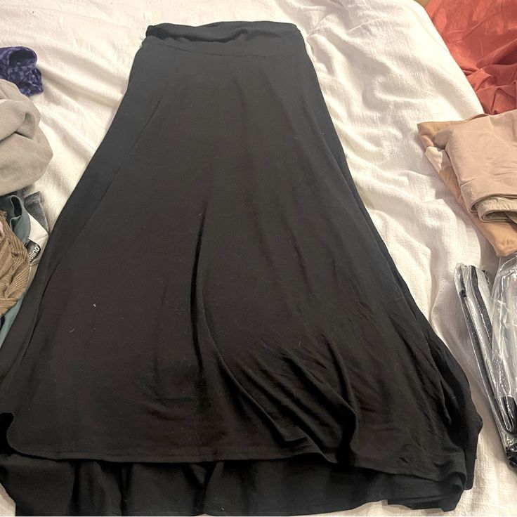 Nwot. Lularoe Xxs Black Maxi Skirt. Never Worn. Very Stretchy. Casual Black Lined Maxi Skirt, Black Fitted Maxi Skirt Casual, Black Fitted Casual Maxi Skirt, Fitted Black Maxi Skirt Casual, Fitted Black Casual Maxi Skirt, Spring Black Stretch Maxi Skirt, Black Stretch Maxi Skirt For Spring, Black Stretch Maxi Skirt For Night Out, Casual Black Maxi Skirt For Night Out