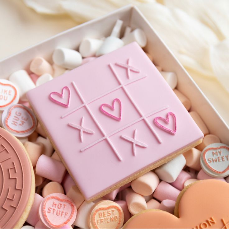 a box filled with lots of cookies and candies