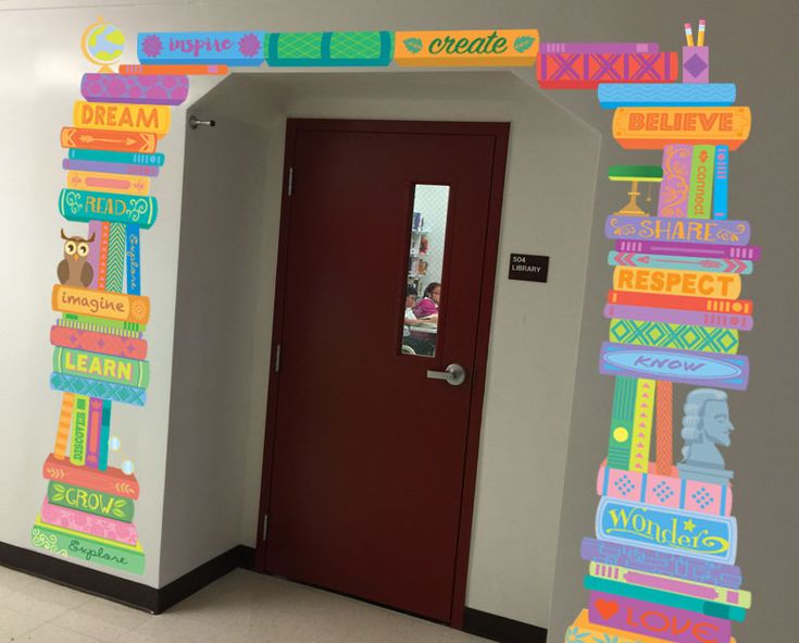 the door is decorated with many different colors and shapes, including letters that spell out words