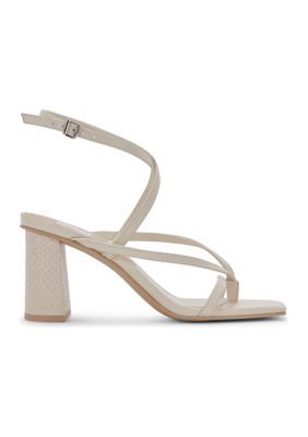 Crafted out of sophisticated leather, the Paroo Sandals from Dolce Vita boast an iconic strappy silhouette and trend-forward block heel. | Dolce Vita Women's Paroo Sandals, Ivory, 8.5M Chic Adjustable Block Heel Shoes, Spring Leather Strappy Block Heels, Spring Strappy Leather Block Heels, Chic Heels With Padded Heel And Adjustable Fit, Chic Adjustable Heels With Padded Heel, Cream Sandals With Heel Loop, Low Heel, Cream Low Heel Sandals With Heel Loop, Modern Cream Sandals With Padded Heel, Chic Adjustable Open Heel Heels