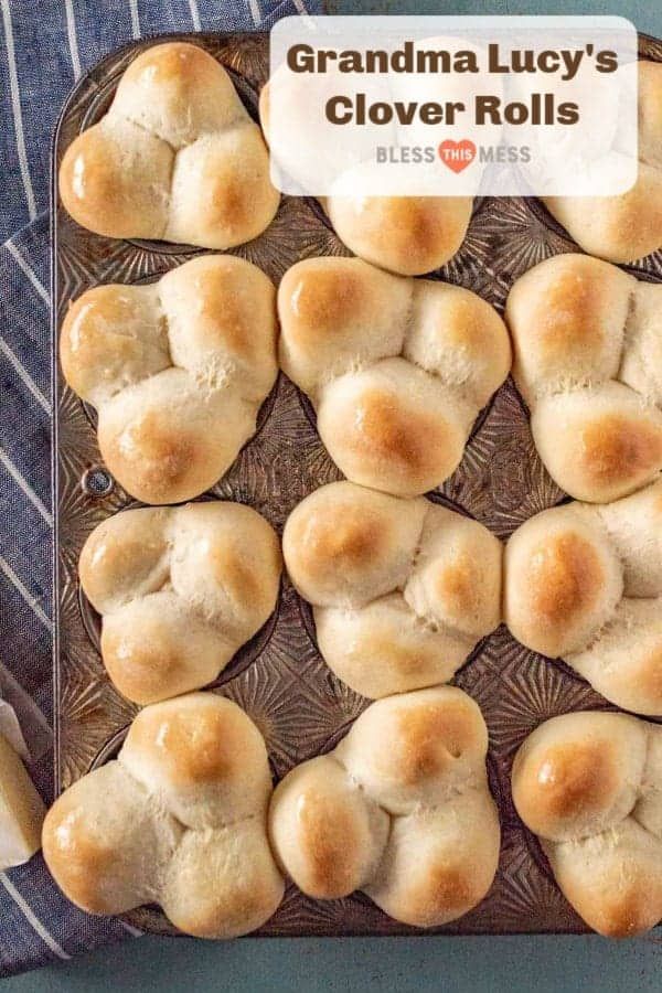 a baking pan filled with rolls on top of a table