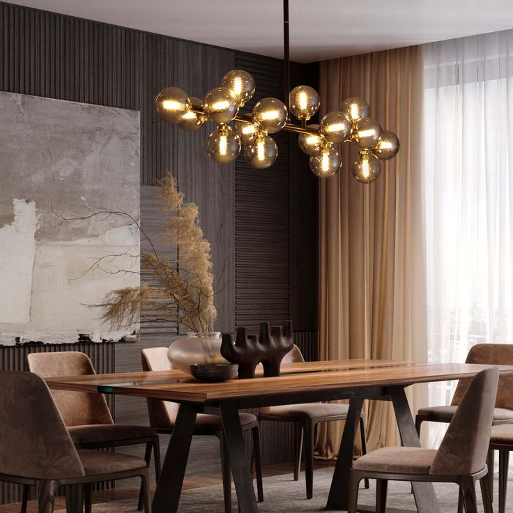 a dining room table with chairs and a chandelier