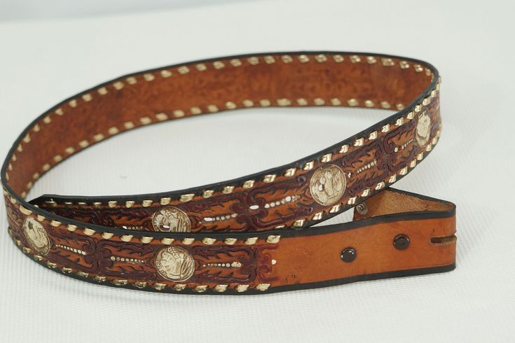 This is a beautiful western style leather belt. 4cm/ 1,6 inch wide.. Embossed genuine leather brown belt. Buckle is removable. no buckle  stamped "hecho en mexico                     cintos imperial  de piel " leangth 112cn - 44 in Adjustment of size between 32,25"/82 cm to 41"/104 cm 4 mm thickness weight 0,14 kg - 0,31 Lb SHIPPING Sending the order is carried out within 1-2 days except weekends. Orders are sent by AIR MAIL. Ships with tracking number. After the shipment I will provide you the tracking number to your package, so you can see where it is and when you will receive it. Southwestern Hand Tooled Leather Belt, Southwestern Style Hand Tooled Leather Belt, Traditional Brown Belt Buckles With Matching Belt, Traditional Brown Belt Buckles, Traditional Leather Belt With Concho, Adjustable Brown Traditional Belt Buckles, Adjustable Embroidered Brown Belt, Adjustable Brown Embroidered Belt, Traditional Brown Belt Buckle With Belt Included