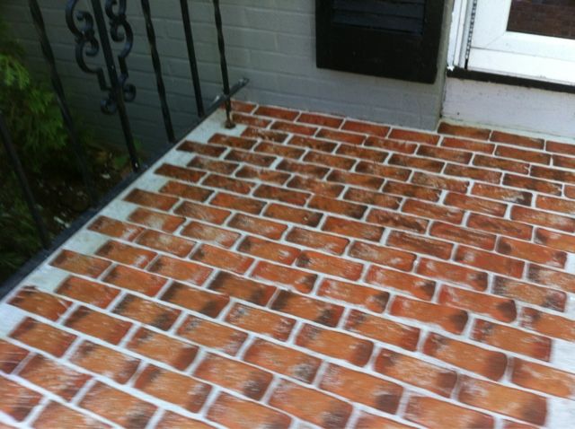 an image of a brick patio being cleaned