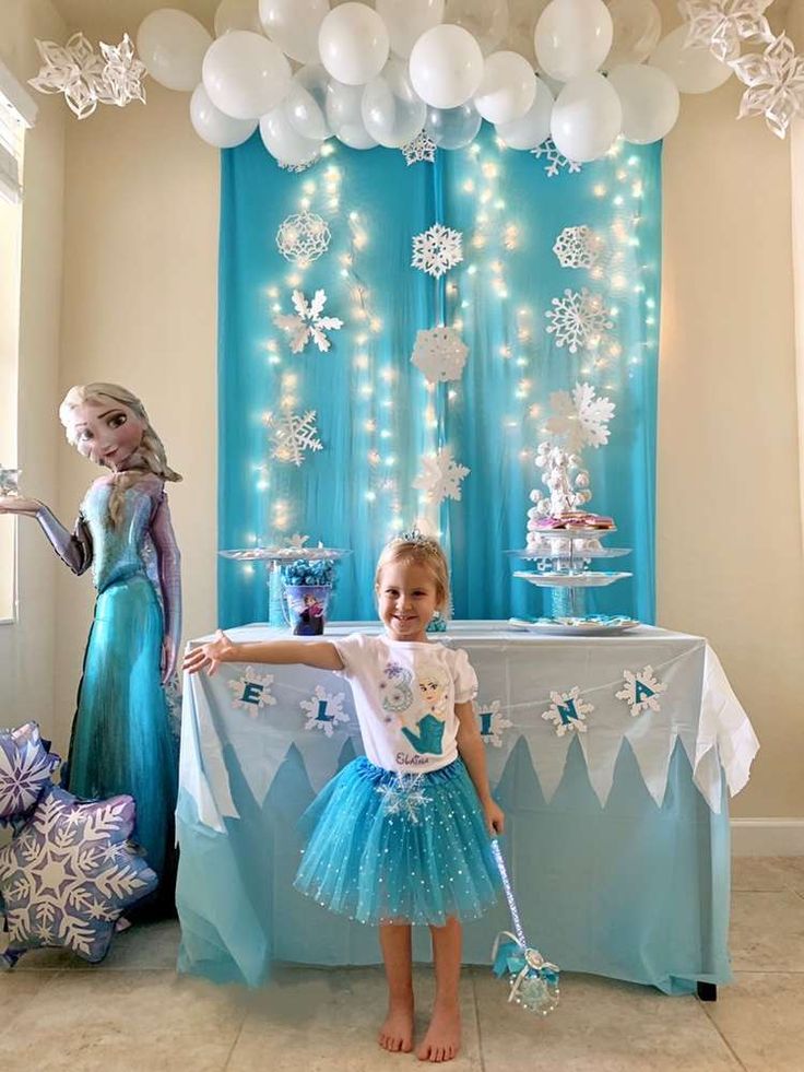 Elaina’s Frozen Celebration  | CatchMyParty.com Frozen Theme Party Decorations, Frozen Birthday Decorations, Disney Birthday Party Ideas, Frozen Birthday Party Decorations, Elsa Birthday Party, Frozen Decorations, Deco Disney, Frozen Bday Party, Frozen Party Decorations