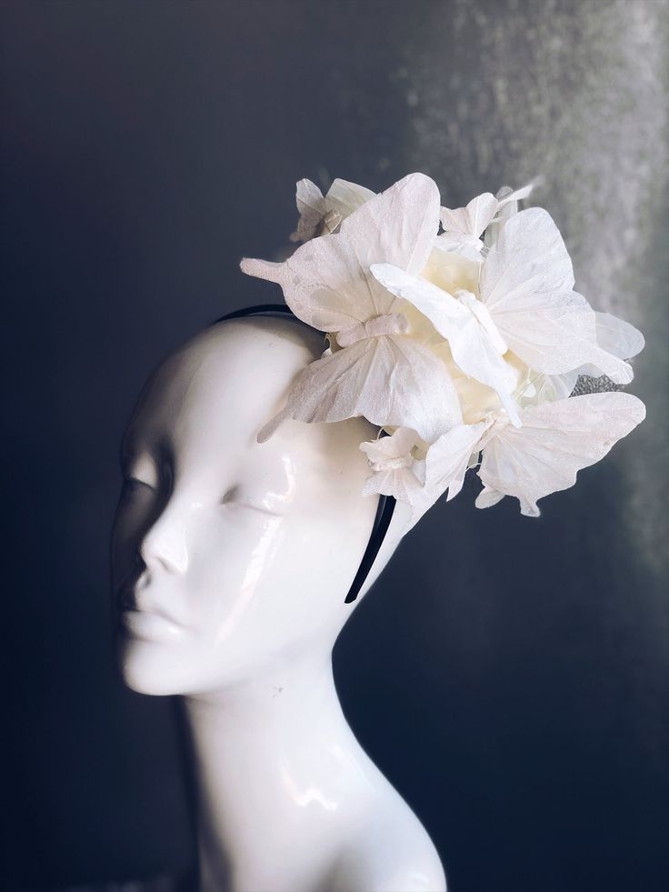 Fascinator hat with white butterflies on a white flower. Butterfly Fascinator, Mardi Gras Kid, Kids Party Packs, White Butterflies, Female Mask, Flower Fascinator, Fascinator Hat, Garden Parties, White Butterfly