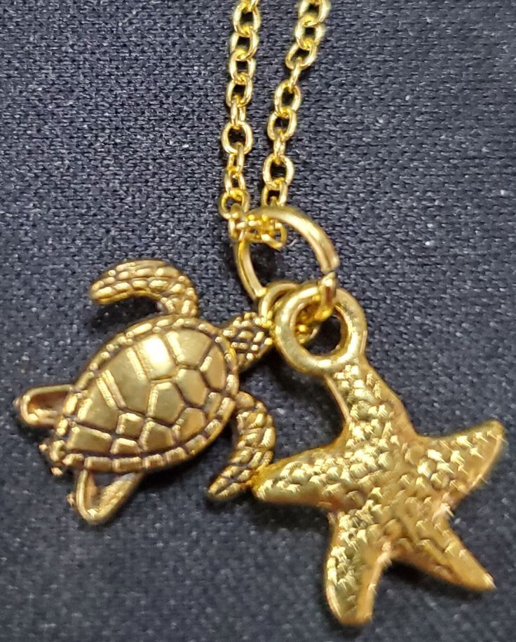 20 inch gold plated chain with gold turtle and sea star charms Gold Charm Necklace With Star Charm For Beach, Gold Charm Necklace With Star For Beach, Gold Star Charm Necklace For Beach, Ocean-inspired Gold Jewelry With Starfish Charm, Gold Starfish Charm Jewelry, Gold Starfish Charm Necklace Gift, Gold Necklace With Starfish Charm For Gift, Gold Nautical Jewelry With Star Charm, Ocean-inspired Gold Jewelry With Star Charm