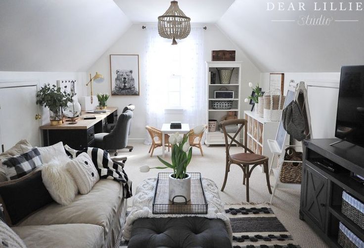 a living room filled with furniture and a flat screen tv