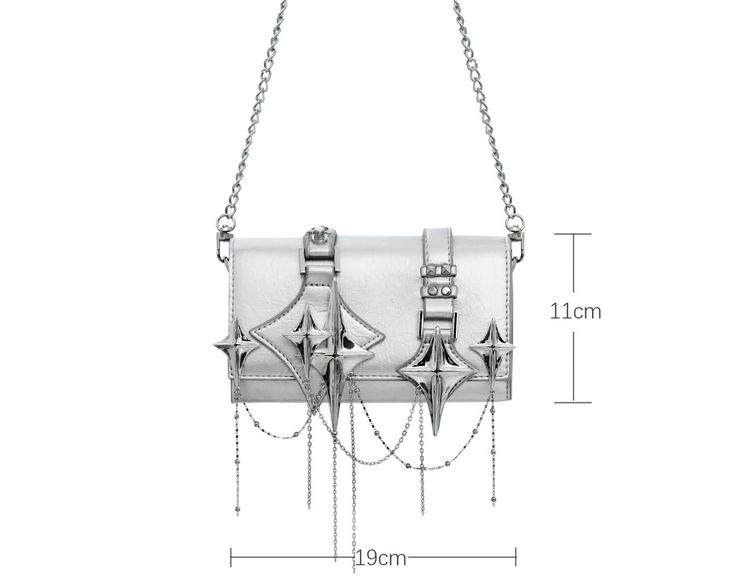 High-Quality Materials: This handbag is meticulously crafted with an exquisite combination of 18K platinum plating and high-end leather, ensuring both durability and a sophisticated appearance. The premium materials used provide a luxurious finish, setting it apart in terms of quality and elegance. Size Details: Measuring 19cm in length and 11cm in height, the Star Trails Chain Handbag Satchel™ offers a compact yet spacious interior, perfect for carrying your essentials. Its versatile size makes it suitable for various occasions, from casual outings to formal events. Novel Design: What truly makes this handbag unique is its distinctive four-pointed star embellishments, adding a touch of individuality and flair. The elegant chain detail further enhances its chic look, making it a stylish ac Slytherin House, Star Trails, Chain Handbag, Ring Trends, Stylish Accessories, The Star, Ring Necklace, Sterling Silver Rings, Platinum