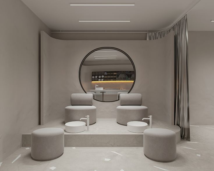 a circular mirror in the middle of a room with chairs and stools around it