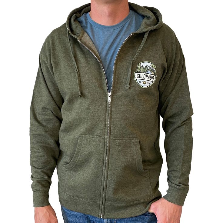 A hooded sweatshirt version of our best selling Woodland t-shirt, this Colorado hoodie is an awesome combination of organic outdoor colors and ColoradoCool's bold design style. Features a sweet outdoor Colorado landscape, big "COLORADO" text, Colorado's established date and a nice subtle topo map in the background. The smaller design on the front is perfect for those who like to put into practice a little bit of that "mullet approach", business in the front and party in the back. Snag this sweet Colorado Hoodie, Colorado Outfits, Colorado Landscape, Topo Map, Hoodie Green, Bold Design, Small Designs, Design Style, Zip Up