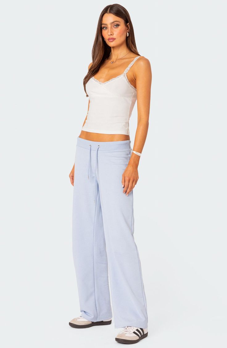 Feel the comfort of these relaxed-fit sweatpants cut from a supersoft cotton blend with straight legs. Elastic/drawstring waist 50% cotton, 50% polyester Machine wash, dry flat Imported Cotton Lounging Bottoms, Relaxed Fit Drawstring Bottoms For Loungewear, Spring Wide Leg Lounging Pants With Drawstring, Athleisure Loungewear Bottoms With Drawstring, Athleisure Bottoms With Drawstring For Loungewear, Cotton Pants With Elastic Waistband For Loungewear, Comfortable Sweatpants For Spring Relaxation, Cotton Lounging Sweatpants, Relaxed Cotton Bottoms For Leisure