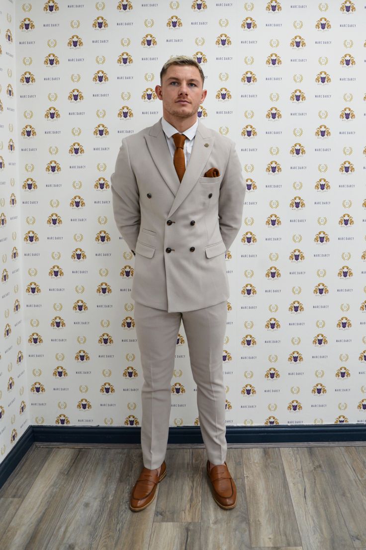 As seen on MK Dons Footballer Callum Hendry! If you are looking for a suave and versatile suit, add this men's double-breasted suit to your inventory.The fabric is made from soft and comfortable poly-viscose cloth, which has been enhanced with lycra for added stretch and flexibility. Features Slim fit Double-breasted blazer Notch lapel Double back vent Four button cuff Complimentary pocket square Functional inside and outside pockets to the blazer Style Tip | Accessorise with tan to match the ac Double-breasted Three-piece Suit For Business, Tailored Double Breasted Suit With Double Button, Tailored Double-breasted Suits In Suiting Fabric, Classic Tailored Double Breasted Suit For Groom, Double-breasted Business Suits In Suiting Fabric, Fitted Double Breasted Suit For Business Casual, Fitted Double Breasted Suit With Notch Lapel, Double-breasted Suits With Double Button Closure, Double-breasted Suit With Double Button Closure