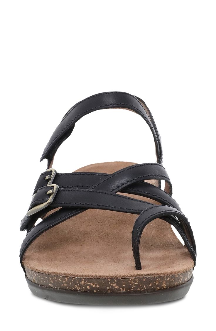 A strappy leather upper seals the summery status of this adjustable sandal set on a contoured cork footbed for optimal comfort. Adjustable hook-and-loop straps Leather upper and lining/rubber sole Imported Adjustable Slingback Footbed Sandals With Leather Footbed, Adjustable Slingback Leather Footbed Sandals, Adjustable Slingback Sport Sandals With Buckle, Black Cork Sandals With Buckle Closure, Adjustable Slingback Sandals With Heel Loop, Black Cork Sandals With Leather Footbed, Leather Sandals With Cork-bed Midsoles And Toe Loop, Adjustable Strappy Sandals With Heel Loop, Black Cork Footbed Sandals For Summer