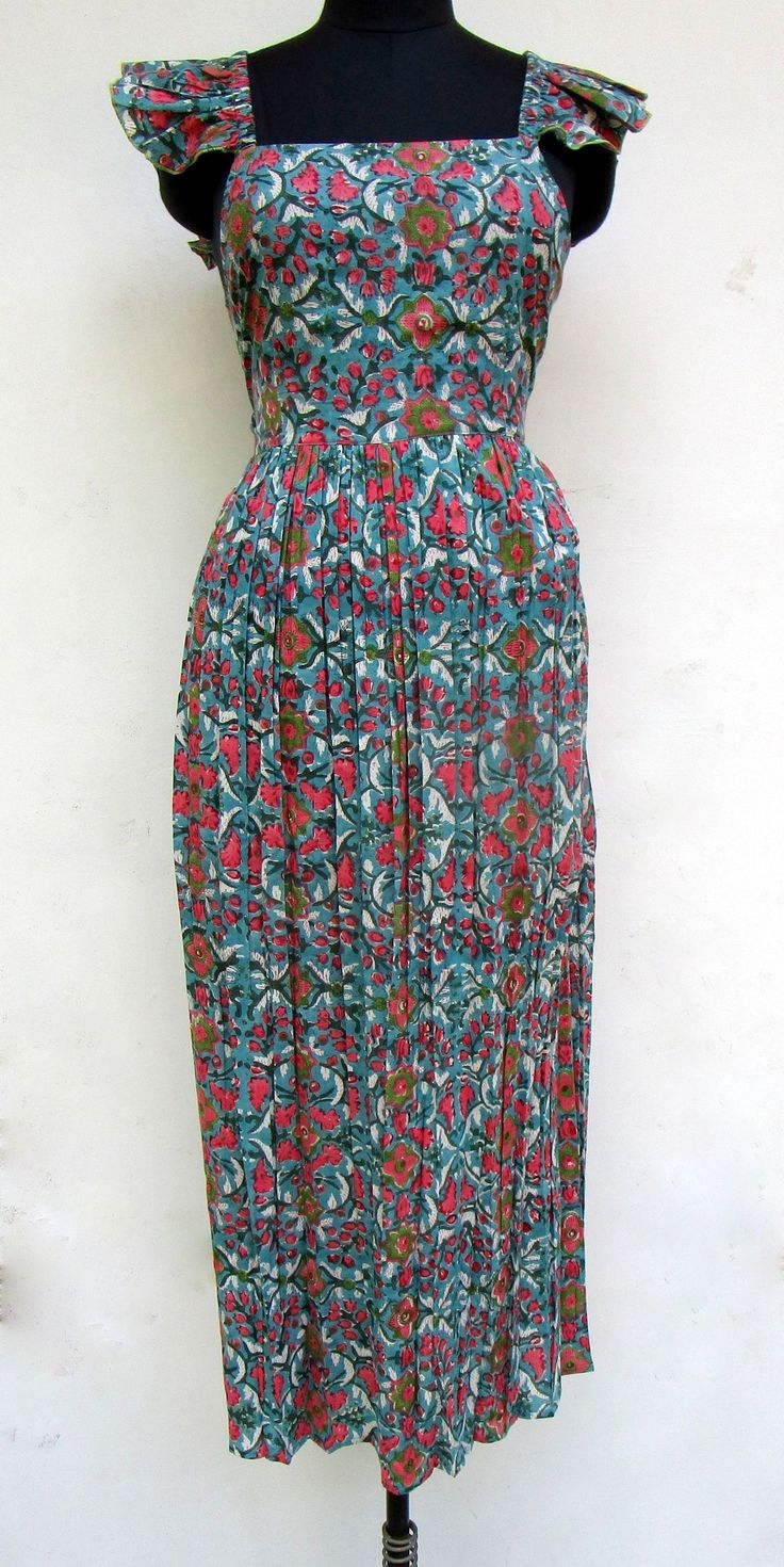 "ITEM DESCRIPTION sparkle colors flowery printed maxi dress - square neckline with back strap maxi dress - short sleeve boho maxi dress Features: short sleeve, square neck, Long dress Material: Cotton cambric Fabric: 100% cotton soft light weight ethnic print fabrics  Sleeve Length = 5 inch For more sizes & their measurement, please refer our below chart to understand the sizes variations available with us For your size requirement, please mention your size in seller note at the time of buying. Bohemian Maxi Dress With Vintage Print, Bohemian Long Dress For Garden Party, Green Maxi Dress With Colorful Pattern, Colorful Pattern Green Maxi Dress, Floral Print Short Sleeve Patterned Maxi Dress, Short Sleeve Patterned Floral Print Maxi Dress, Short Sleeve Floral Print Patterned Maxi Dress, Spring Bohemian Maxi Dress With Ikat Print, Green Floral Print Maxi Dress For Festivals