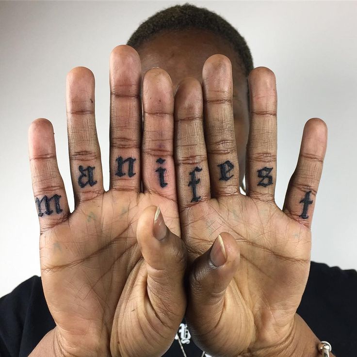 a man is holding his hands up with the words married written on their palms