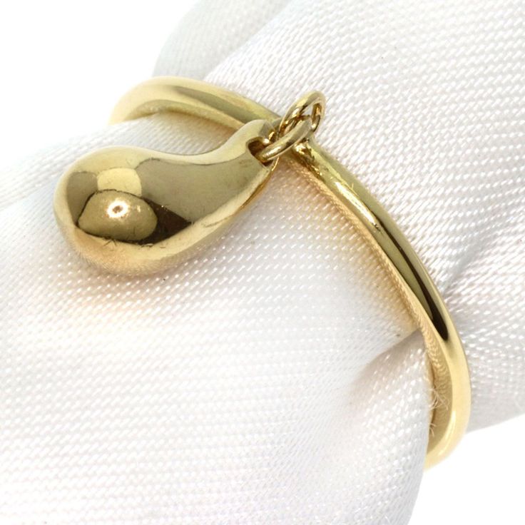 Used Tiffany & Co. Teardrop Ring, 18k Yellow Gold, Women's, Tiffany (Sku: Gzl12spe) === General === Brand : Tiffany === Design === Type : Band Ring Gender : Women Material : Yellow Gold (18k) === Size === Other Size : 7 === Included Items === Accessories : None Accessories Notice : Before Purchasing, Please Refer To The Images Of The Accessories Included With The Item. === Condition === Condition : Used (Very Good) Ranking : Rank A Used - A Few Traces Of Usage, Some Scratches / Dirt Can Be Seen Tiffany Color, Teardrop Ring, Tiffany Jewelry, Tiffany & Co., Band Ring, Luxury Branding, Band Rings, Size 7, Yellow Gold