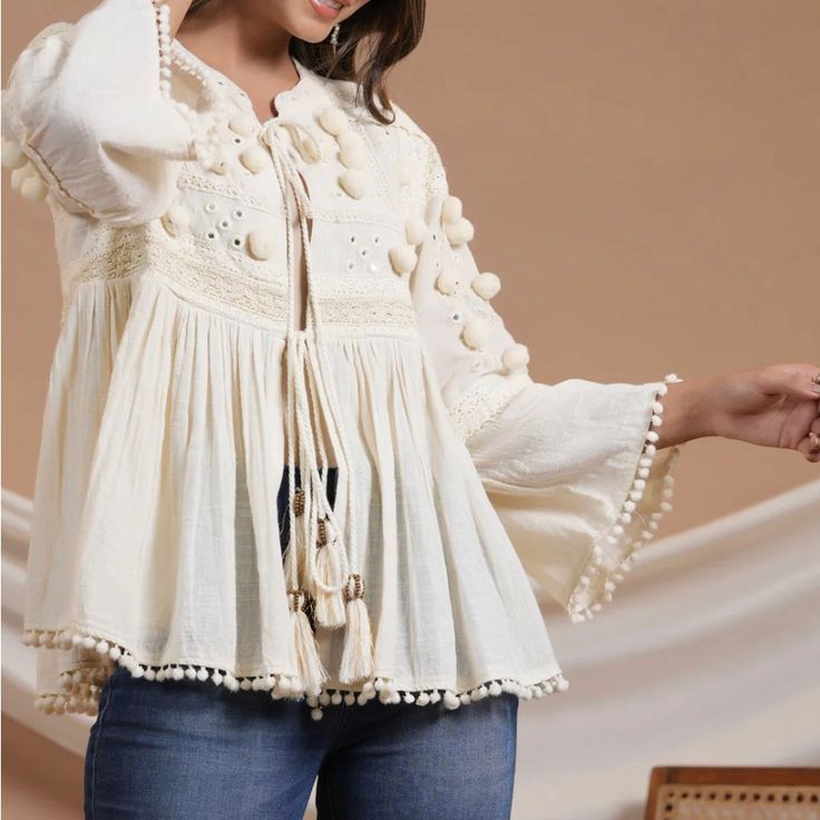 Embroidered & Tassel Accents Long Sleeve Size L Hand Crafted Summer Embroidered Long Sleeve Top With Lace Trim, Summer Long Sleeve Embroidered Top With Lace Trim, Embroidered Beige Blouse For Vacation, Bohemian Embroidered Long Sleeve Top With Lace Trim, Vacation Embroidered Beige Blouse, Cream Summer Tops With Chikankari Embroidery, Chic Embroidered Tops For Vacation, Summer Cream Tops With Chikankari Embroidery, Spring Beige Embroidered Cotton Top