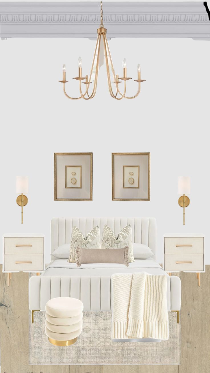 a white bed sitting under a chandelier next to two pictures on the wall