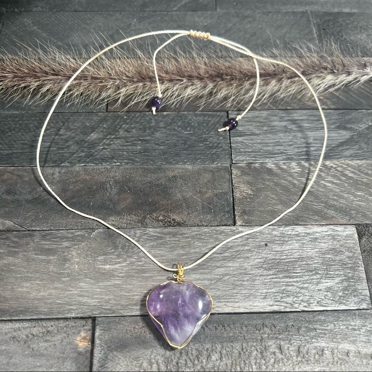 Beautiful Purple Amethyst Heart Pendant Necklace. This Beautiful Wire Wrapped Heart Necklace Is Handmade Using Gold Wire, 0.8 Mm Waxed Polyester Cord Waterproof! Amethyst Round Beads Finished With A Sliding Macram Knot. This Necklace Makes A Great Gift!! Length Is 24” Purple Double Heart Jewelry For Gifts, Purple Double Heart Jewelry Gift, Purple Necklace With Adjustable Chain, Purple Double Heart Jewelry With Heart Charm, Purple Double Heart Charm Jewelry, Heart Shaped Amethyst For Jewelry Making, Heart-shaped Amethyst For Jewelry Making, Handmade Heart-shaped Purple Jewelry, Handmade Purple Heart-shaped Jewelry