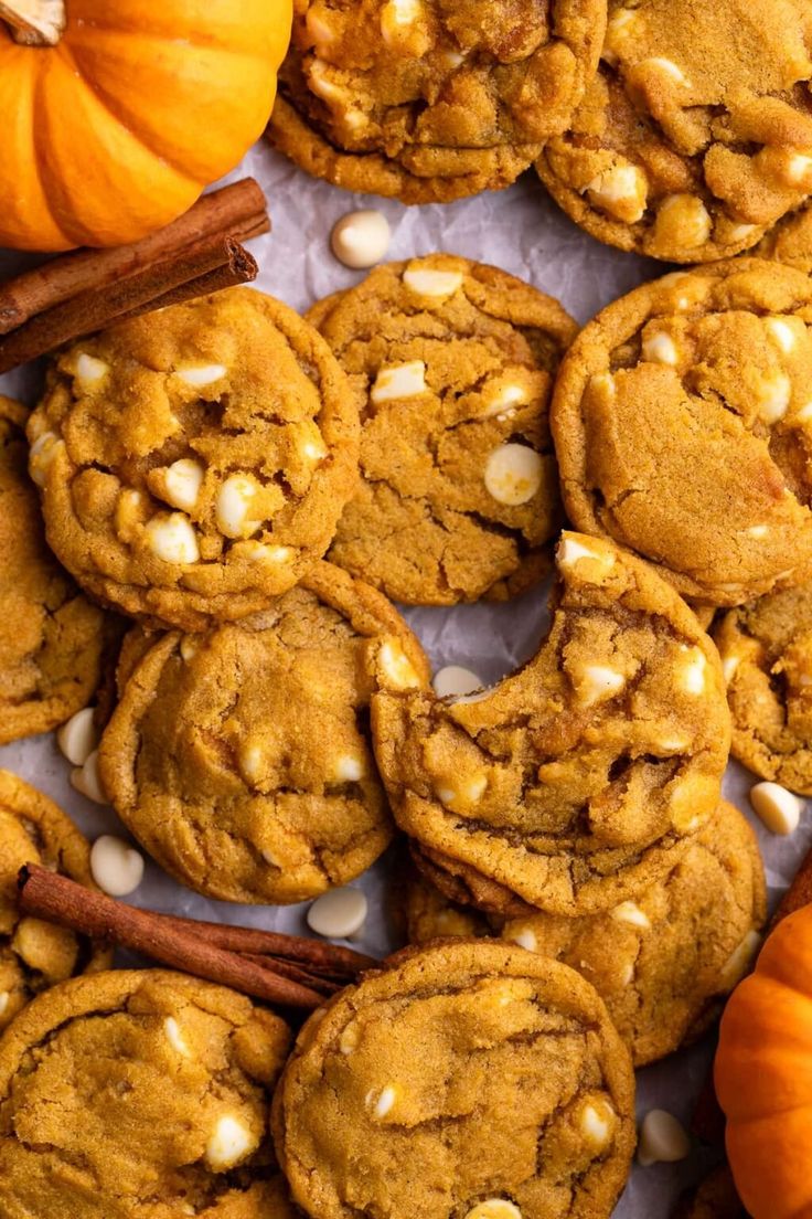 pumpkin spiced cookies with white chocolate chips and cinnamon sticks