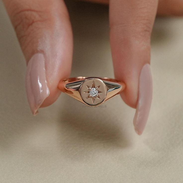 Natural Diamond Signet Ring/ 14K Rose Gold Elegant, Minimalist Design/ Dainty, Timeless Jewelry for Everyday Wear or Special Occasions/ Round Diamond Starburst Design SKU: IJS0031 ✯✯ 𝐃𝐢𝐚𝐦𝐨𝐧𝐝 𝐃𝐞𝐭𝐚𝐢𝐥𝐬 ✯✯ ➺ Shape: Round ➺ Color-Clarity: EF-VS/SI, GH-VS/SI, IJ-SI ➺ Size: 2.50 MM ➺ Weight: 0.050 CT ➺ Diamond Type: Natural Earth-Mined ✯✯ 𝐑𝐢𝐧𝐠 𝐃𝐞𝐭𝐚𝐢𝐥𝐬 ✯✯ ➺ Band Width: 1.80 MM ➺ Band Thickness: 1.70 MM ✯✯ 𝐆𝐨𝐥𝐝 / 𝐏𝐥𝐚𝐭𝐢𝐧𝐮𝐦 𝐃𝐞𝐭𝐚𝐢𝐥𝐬 ✯✯ ➺ It can be made in 10K/ 14K Adjustable Rose Gold Dainty Signet Ring, Rose Gold Midi Rings Fine Jewelry, Stackable Rose Gold Signet Ring For Anniversary, Minimalist Tarnish Resistant Rose Gold Diamond Ring, Minimalist Rose Gold Tarnish Resistant Diamond Ring, Rose Gold Tarnish Resistant Midi Rings For Wedding, Rose Gold Signet Ring With Single Diamond, Adjustable Rose Gold Signet Ring For Wedding, Rose Gold Midi Rings With Single Diamond As Gift