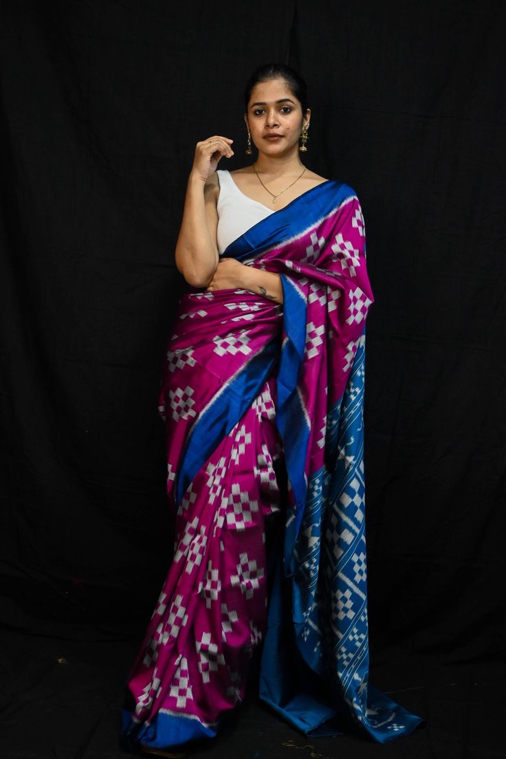 Weaver communities of Maniabandha and Nuapatana of Odisha traditionally weave this kind of saree. Common motifs are star, temple, conch, rudraksh, fish, chakra, lotus etc. The inspiration of all its designs comes from nature. It is the best of single ikat; one of warp and weft is tied and dyed prior to weaving. The borders and the pallas have tremendous variety and each one of them is attractive and praiseworthy. Specification:  Occasion: Festive Wear Fabric: Mulberry Silk,  Primary Color: Magen Zardozi Border, Chakra Lotus, Ikat Saree, Festive Wear, Handloom Saree, Mulberry Silk, Blouse Piece, Festival Wear, Teal Blue