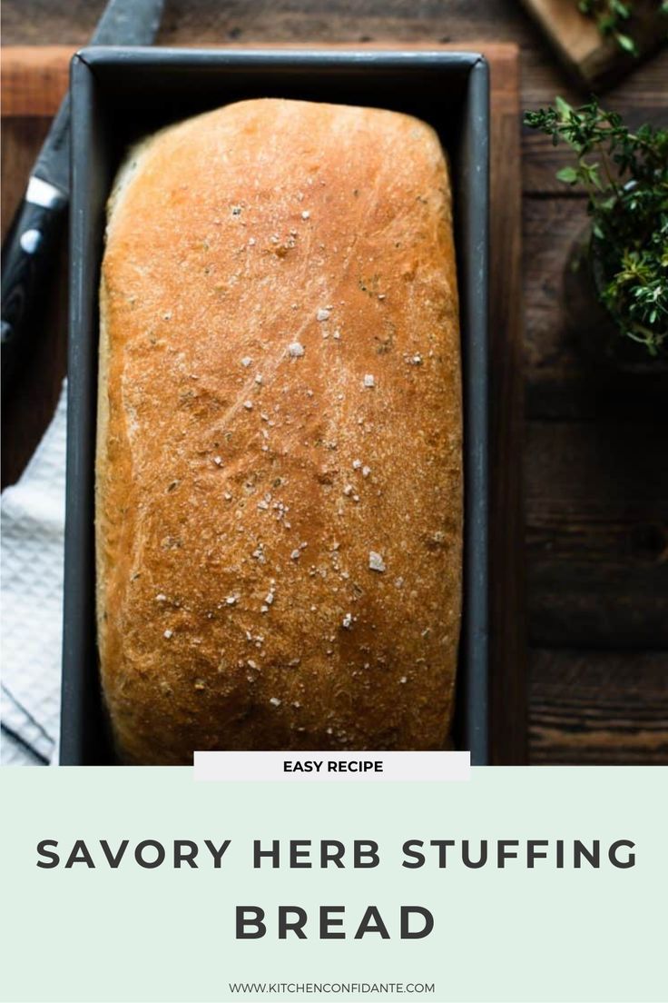 a loaf of savory herb stuffing bread in a black box on a wooden table