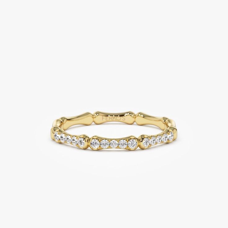 14k Pave Diamond Bamboo Ring | 14k Solid Gold Bamboo Ring / Half Eternity Stacking Bone Ring Minimalist Layering Ring Unique Diamond Ring ▶Item Details * Made to Order * Gold Kt: 14K (also available in 18K) * Available Gold Colors: Rose Gold, Yellow Gold, White Gold * Band Width: 2MM (Widest Part) * Round Diamond: 3 Pcs 1.1 MM * Round Diamond: 6 Pcs 1.2 MM * Round Diamond: 6 Pcs 1.4 MM * Diamond Color & Clarity: G Color SI Clarity * Diamond Ctw: 0.15 ctw * Ready to Ship in 3-10 Business Days ▶ See more of our Diamond Wedding Rings here - https://etsy.me/3YbpVq2 ▶ See our storefront here - http://etsy.me/2lUcVnH  ▶ All store sections here * Diamond Rings - http://etsy.me/2lwKUl8 * Diamond Earrings - http://etsy.me/2lyqVBP * Diamond Necklace - http://etsy.me/2mqa6O1 * Diamond Bracelets - htt Timeless Stackable 14k Gold Diamond Ring, Timeless 14k Gold Stackable Diamond Ring, Timeless 14k Gold Diamond Stackable Ring, Elegant Stackable Diamond Ring With Open Band, Classic 14k Gold Half Eternity Stackable Rings, 14k Gold Half Eternity Diamond Ring With Open Band, Timeless Stackable Rings With Prong Setting, Timeless 14k Gold Stackable Rings With Prong Setting, White Gold Stackable 14k Gold Rings