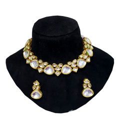 Gold Rodium Polish White and Off White color Necklace in Metal Alloy studded with Kundan White Kundan Jeweled Necklace, White Metal Jewelry Sets For Festivals, White Jeweled Necklaces For Festivals, White Jeweled Necklace For Festivals, White Metal Necklace For Festivals, White Metal Necklaces For Festivals, White Kundan Choker Necklace For Party, Round Kundan Metal Necklace For Party, Round Metal Kundan Necklace For Party