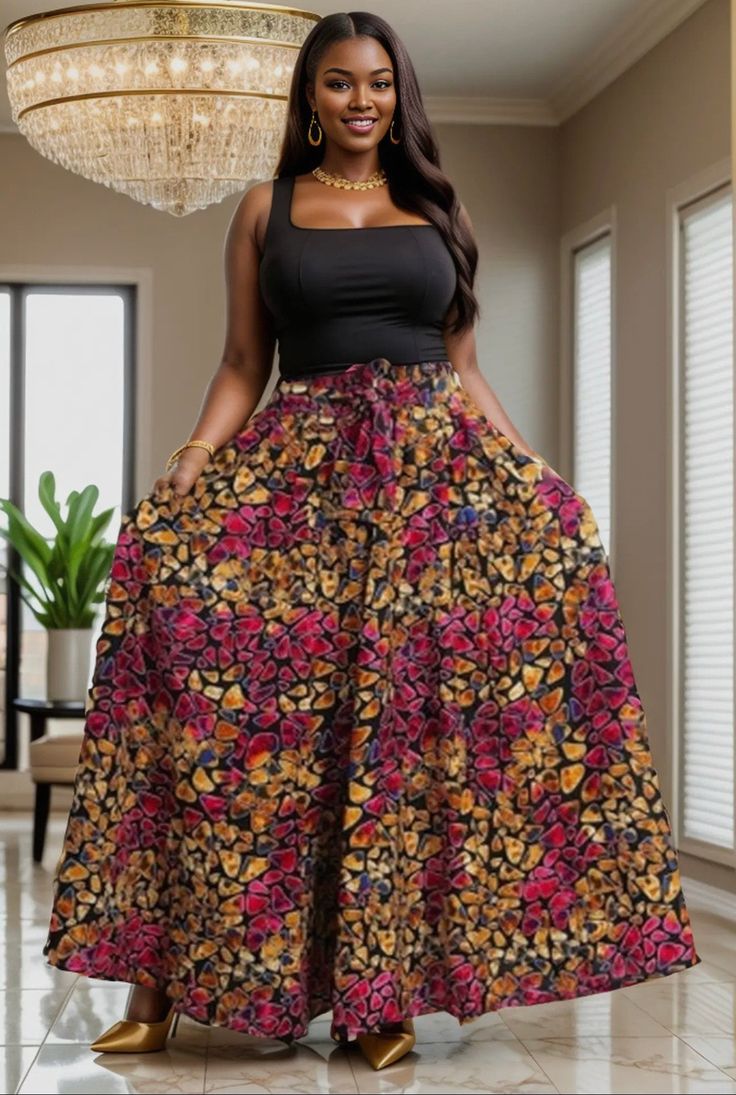 Slip into easy sassiness with this African Print maxi skirt. Has pockets. This comfortable skirt has an elastic waistband with 2 straps and should fit up to a 2X waist. Length is 42". 100% cotton. Hand wash in cold water. Warm iron. Cotton Maxi Skirt With Elastic Waistband For Vacation, Casual Cotton Maxi Skirt, Cotton Maxi Skirt With Pockets For Vacation, Cotton Gathered Maxi Skirt, Cotton Maxi Skirt With Gathered Detail, Cotton Wide-leg Skirt For Vacation, Wide Leg Maxi Skirt With Pockets For Beach, Casual Cotton Maxi Dress With Flowy Skirt, Cotton Maxi Dress With Elastic Waistband