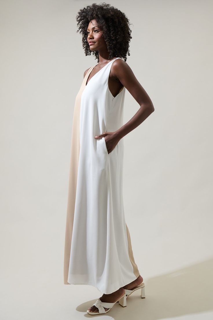 If you’re in the mood for fun and fabulous then the Safford Color Block Shift Maxi Dress! It has a sleeveless and loose fit style. The v-neckline falls down in the front and the sides have hidden pockets. Wear white heels to go along this dress.- V-neck- Color Block- Midi- Pockets- Color: Oatmeal WhiteSize + Fit - Model is 5'8" and wearing size XS- Measurements taken from size S - Chest: 19 1/4"- Length: 54" Fabric Self: 100% Polyester, Contrast: 100% Polyester, Lining: 97% Polyester 3% Spandex Shift Maxi Dress, Maxi Shift Dress, Color Block Maxi Dress, Taste The Rainbow, White Heels, Ruffled Maxi Dress, Bodycon Midi, In The Mood, Midi Dress Bodycon