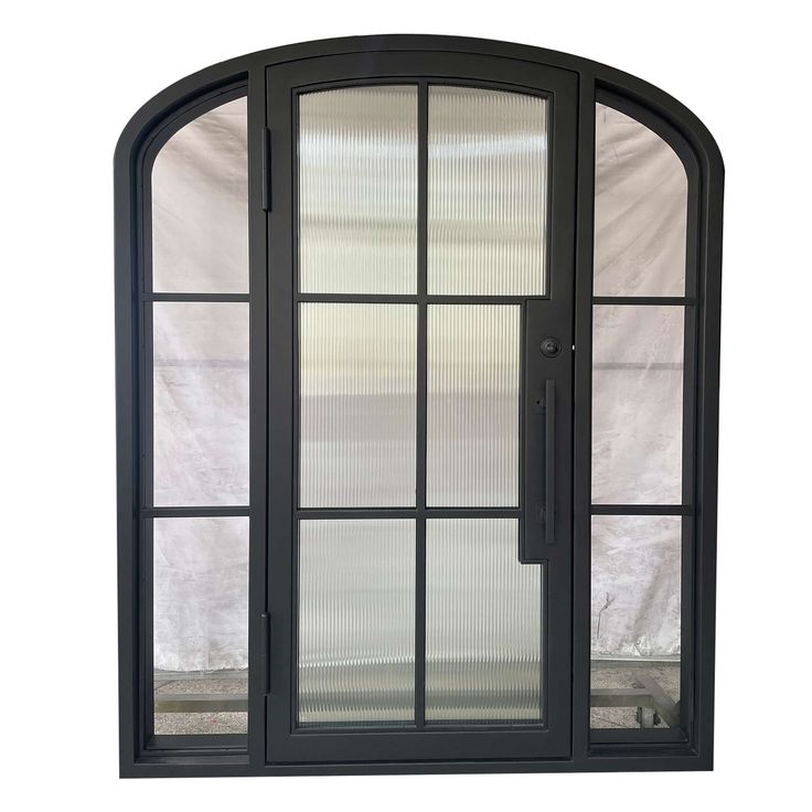 an arched glass door with black frame and side panels on the outside, in front of a white background