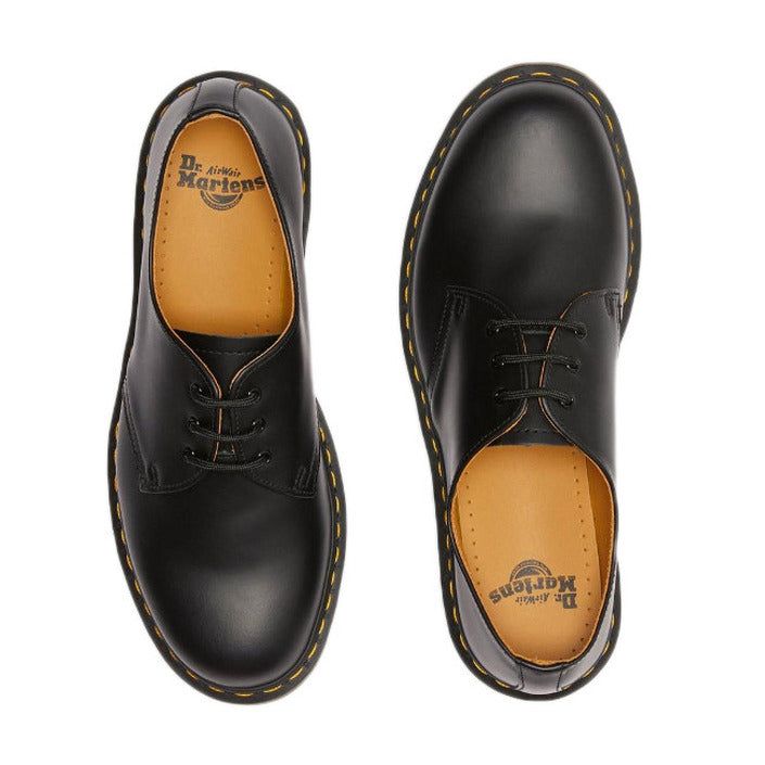 Brand: Dr. Martens Gender: Women Type: Slip on Shoes Season: Spring/Summer PRODUCT DETAIL • Color: black • Fastening: laces COMPOSITION AND MATERIAL • Composition: -100% leather Black Lace-up Dress Shoes For Derby, Black Lace-up Oxfords With Leather Sole, Black Oxfords With Rubber Sole For Spring, Black Leather Lace-up Shoes With Cushioned Footbed, Black Low-top Oxfords With Contrast Sole, Black Plain Toe Dress Shoes For Spring, Black Lace-up Shoes With Rubber Sole, Black Flat Heel Lace-up Shoes With Rubber Sole, Casual Black Lace-up Shoes With Leather Footbed