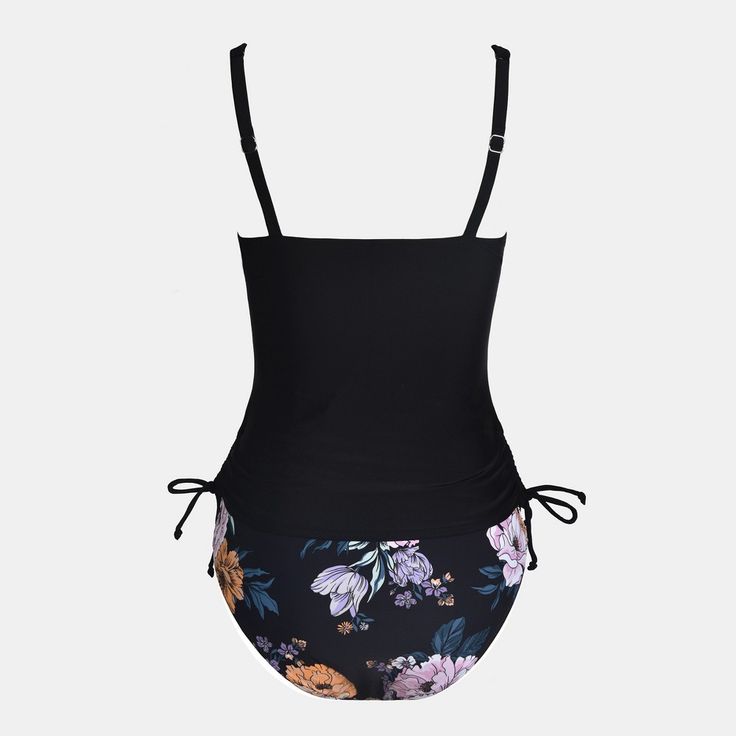 Elevate your beach day ensemble with the Cupshe Women's Cutout Drawstring Tankini Top & Floral Mid Waist Bikini Set. This unique swimsuit combines functionality with flair, featuring a solid black tankini top with an eye-catching twist cutout front and adjustable drawstring lace-up sides. The floral mid-waist bikini bottoms provide ample coverage while adding a vibrant touch to your look.

- Gender: Female
- Age Group: Adult
- Color: Black with floral print
- Material: High-quality swim fabric Fitted Drawstring Tankini For Swimming, Fitted Drawstring Tankini For Sunbathing, Black Swimwear With Drawstring For Pool, Black Drawstring Swimwear For Pool, Black Swimwear With Drawstring For Swimming, Beachwear Swimwear With Drawstring For Vacation, Black Beachy Swimwear For Sunbathing, Fitted Black Tankini For The Beach, Black Summer Tankini For Pool