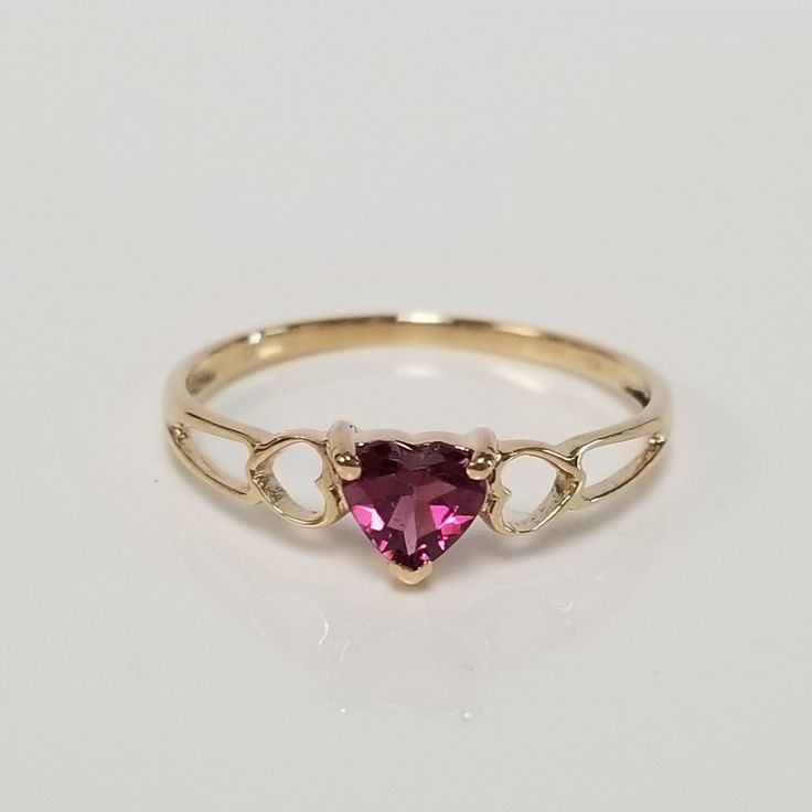 "Thanks for shopping our vintage estate store. We tend to sell well below wholesale and truly hope you enjoy all of our items. Many of the items are one of a kind, so please enjoy scrolling through the pictures and hopefully something will catch your eye. Blacks spots are from camera or reflections. Beautiful estate 10k gold yellow gold natural purple red garnet or spinel Irish Claddagh ring. Retails $289 on sale $169 Ring size: 6.75 Setting: 1/4\" 5mm Band width: 1.5mm Weight: .96 gram Beautifu Heirloom Birthstone Rings For Valentine's Day, Vintage Ring Jewelry For Valentine's Day, Classic Valentine's Day Birthstone Ring, Valentine's Day Classic Round Birthstone Ring, Heirloom Ruby Ring For Valentine's Day, Valentine's Day Classic Birthstone Ring, Heirloom Gold Ruby Ring For Valentine's Day, Classic 14k Gold Heart-shaped Birthstone Ring, Heirloom Heart Cut Ring For Valentine's Day